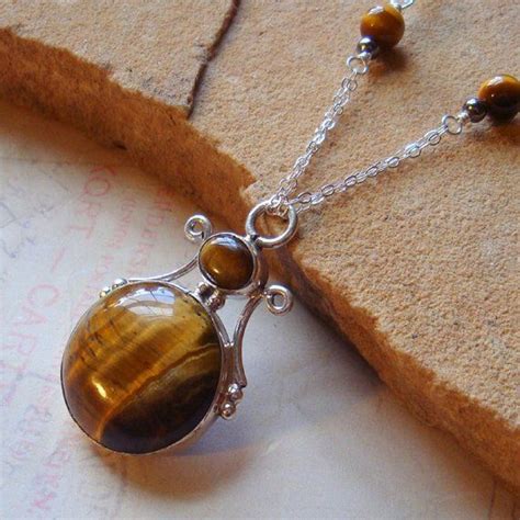 How Tiger Eye Charm Necklaces Can Enhance Your Divination Practice in Practical Magic